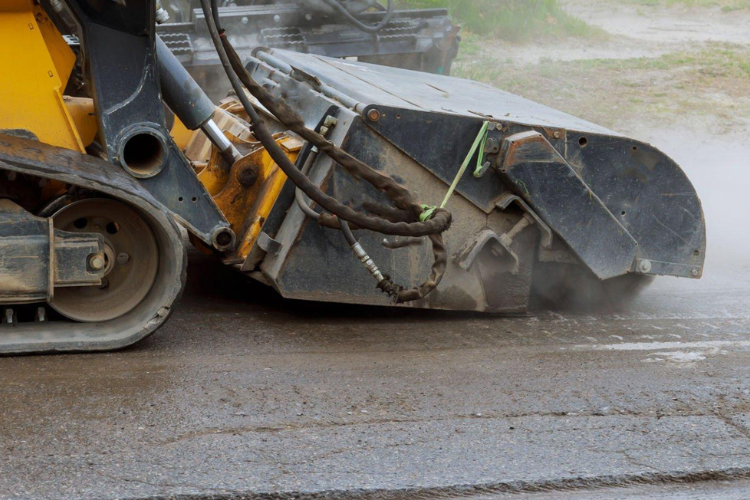 Slurry road surfacing